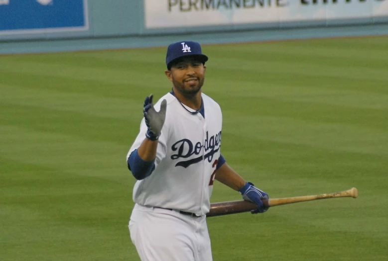 the dodgers baseball player is on the field running