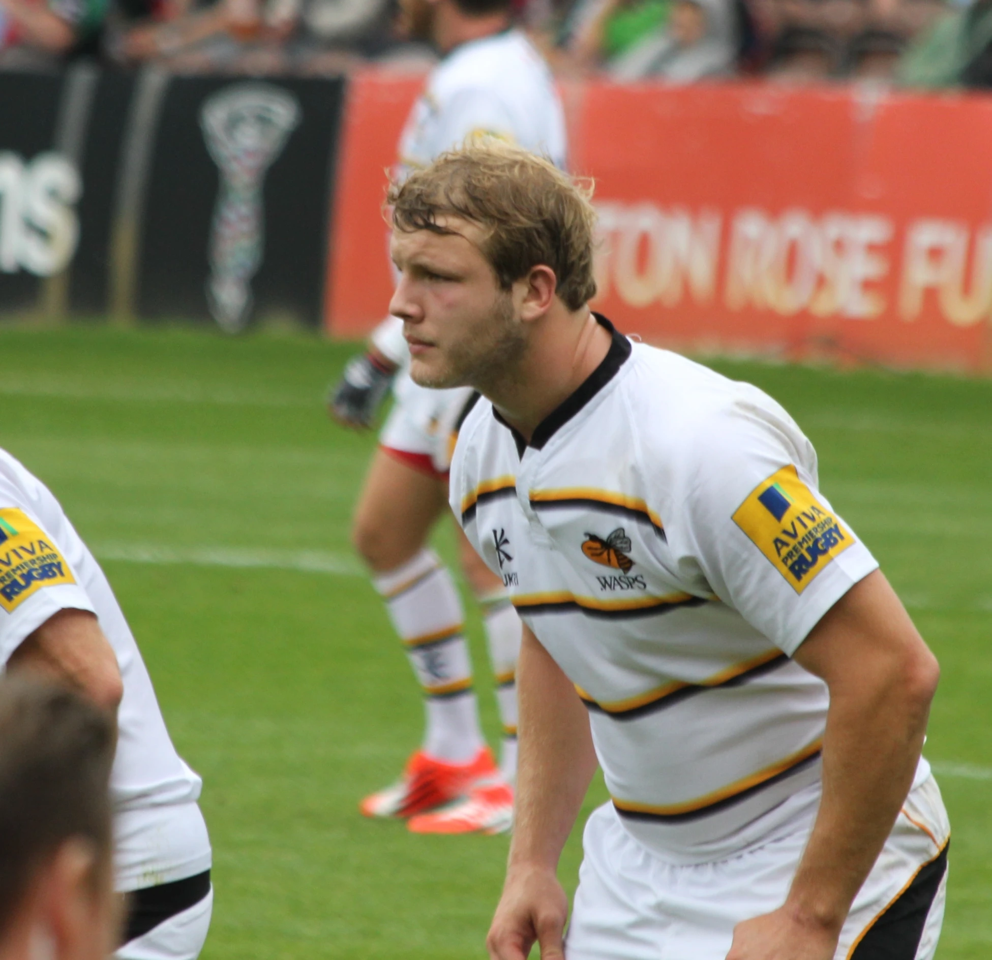 two players are waiting on the field to play