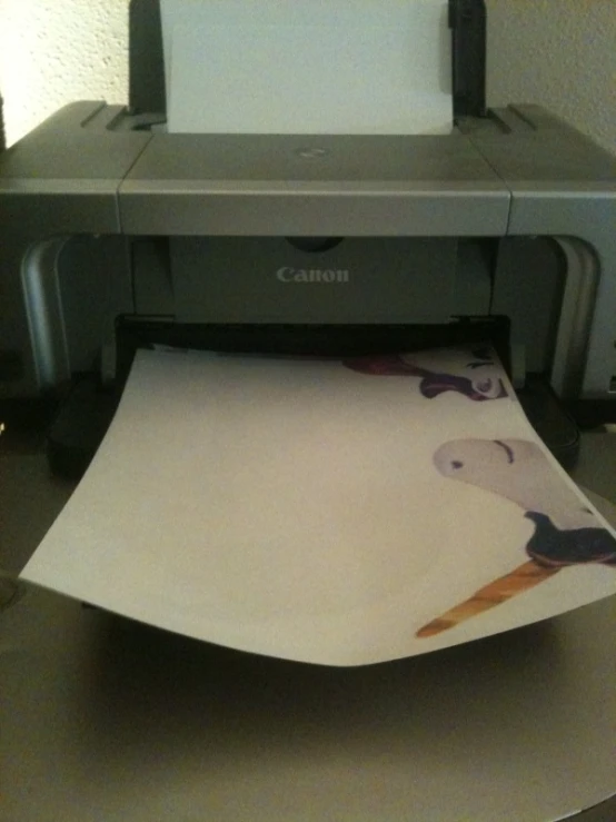 a close up of a printer on top of a table