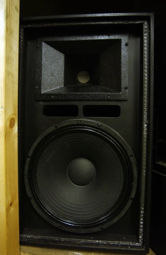 a speakers that is inside a wooden box