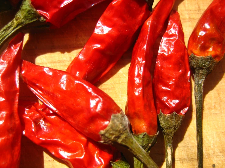 peppers on a  board are very ripe