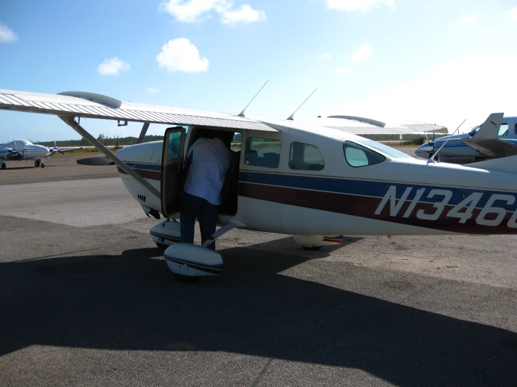 a small plane sitting on top of a tarmac