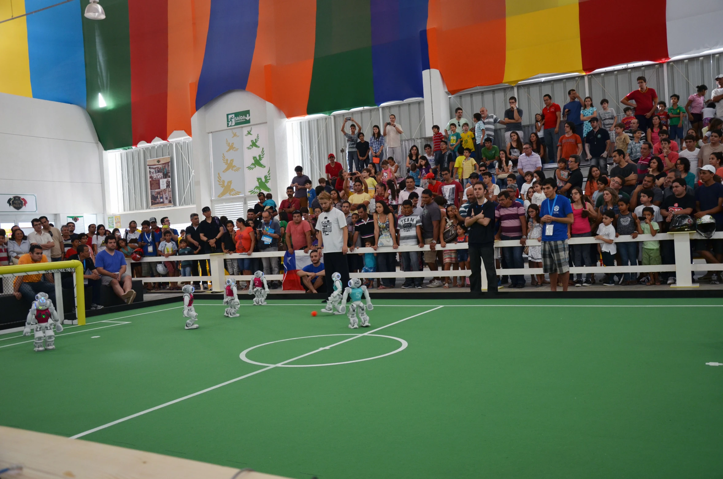 two soccer teams engaged in a game of soccer