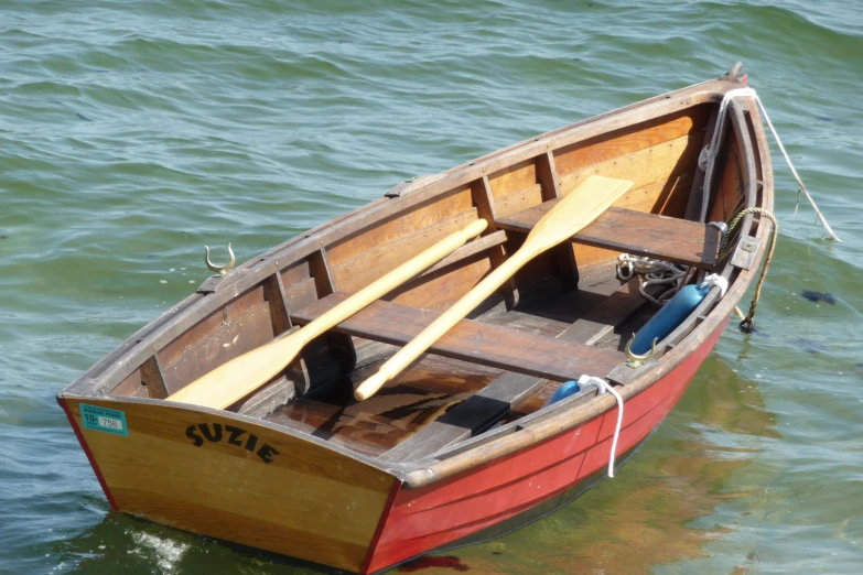 a boat sitting in a large body of water