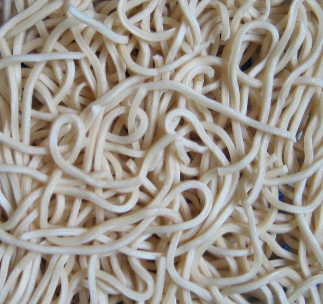 close up of a pile of noodles, with the noodles laid down