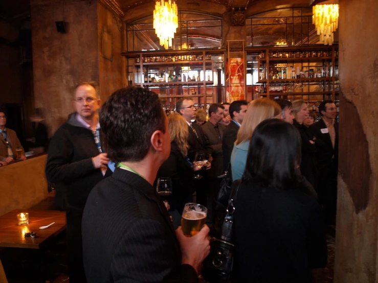 a group of people at a wine bar