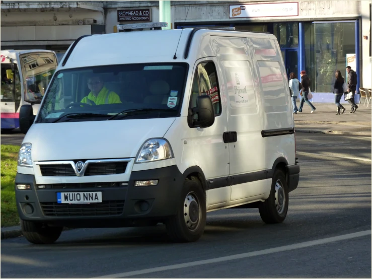 a van that is sitting by the road