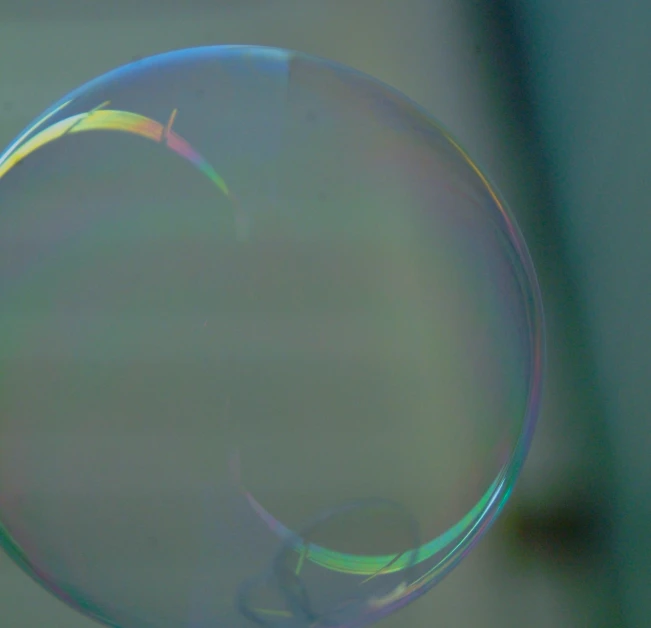 bubbles are being pographed in the air on a sunny day