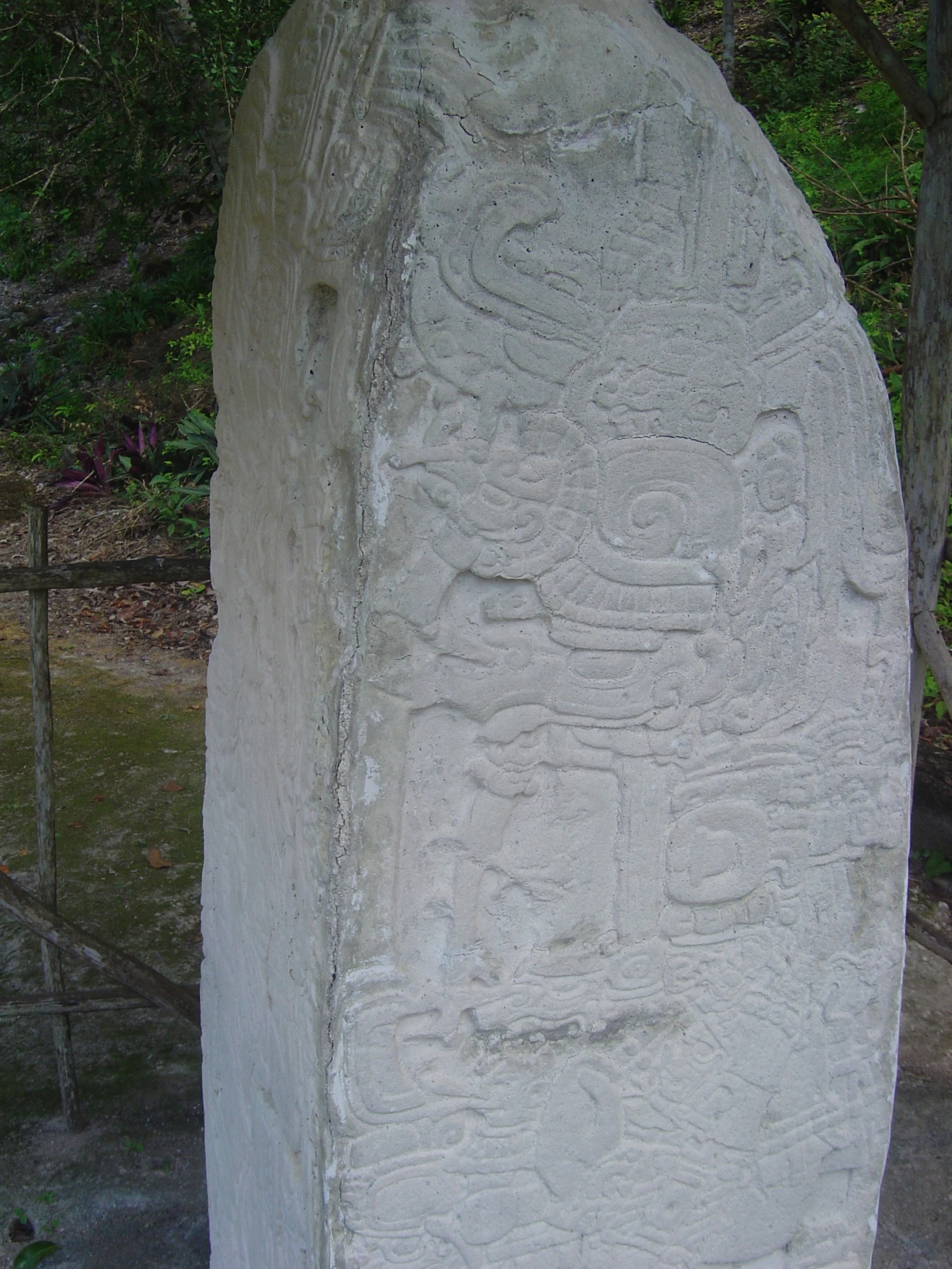 the carvings in the stone are depicting a woman