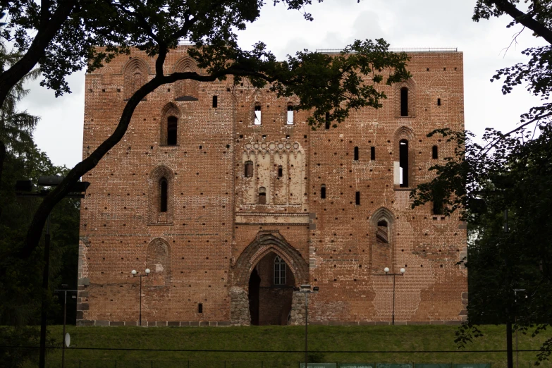 a brick castle is in a park