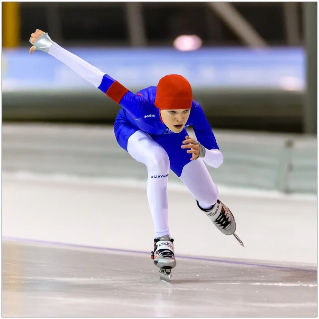 a person is on a skateboard skating on the ice