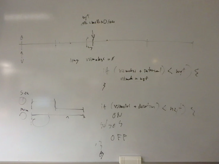 a whiteboard with several calculations written on it