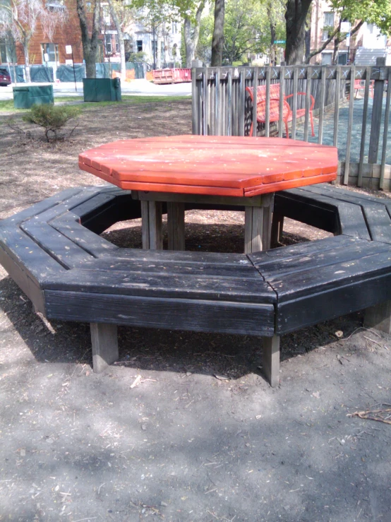 a group of bench with a table on top