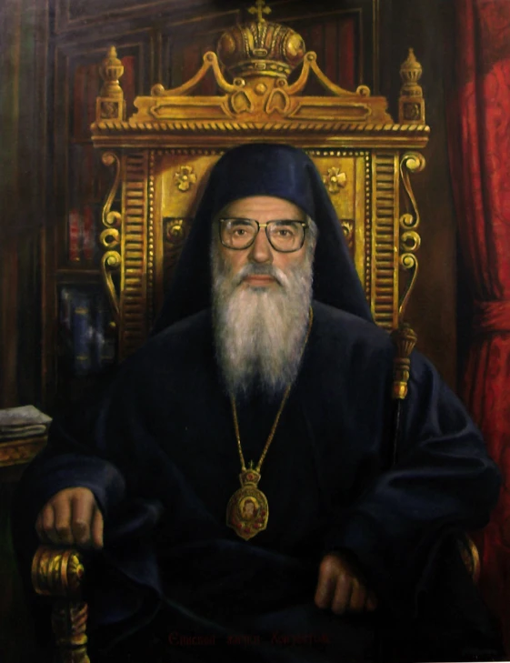 a portrait of a bearded rabbi sitting in front of a golden chair