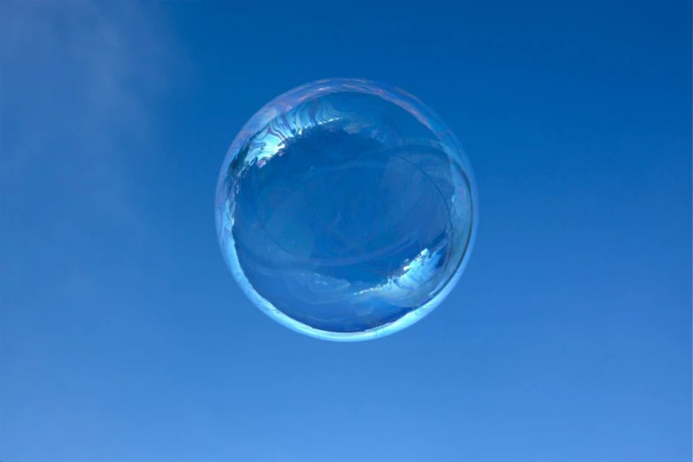 the view from underneath of a very large bubble in the sky