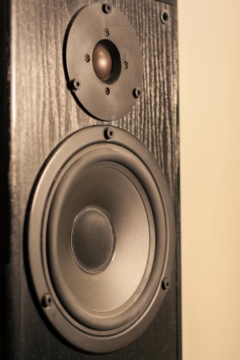a close up of an audio speakers with a sound board