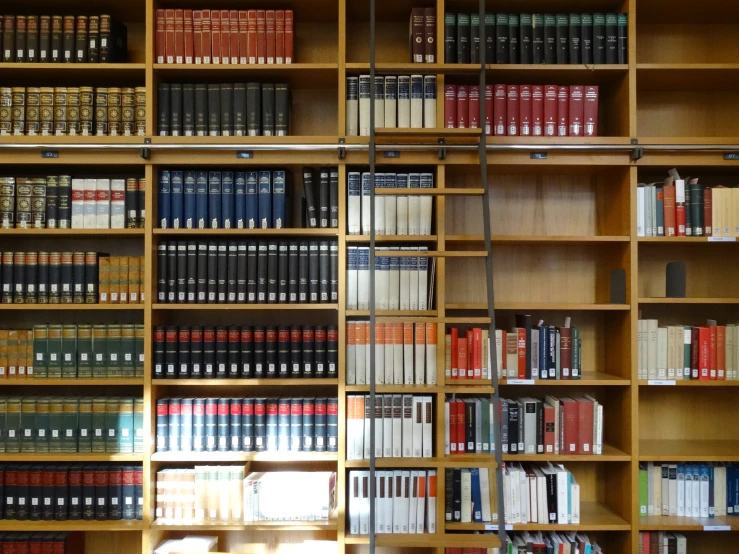 a bookshelf that has many different kinds of books