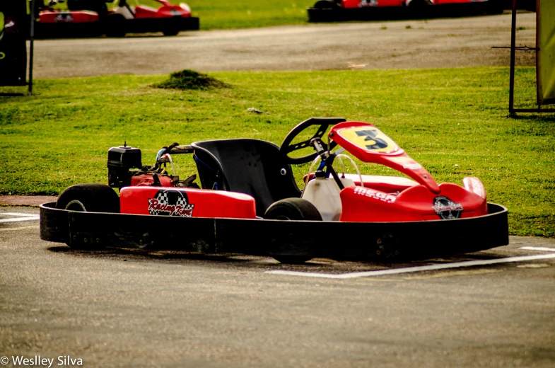 a little race car going around the corner on the track