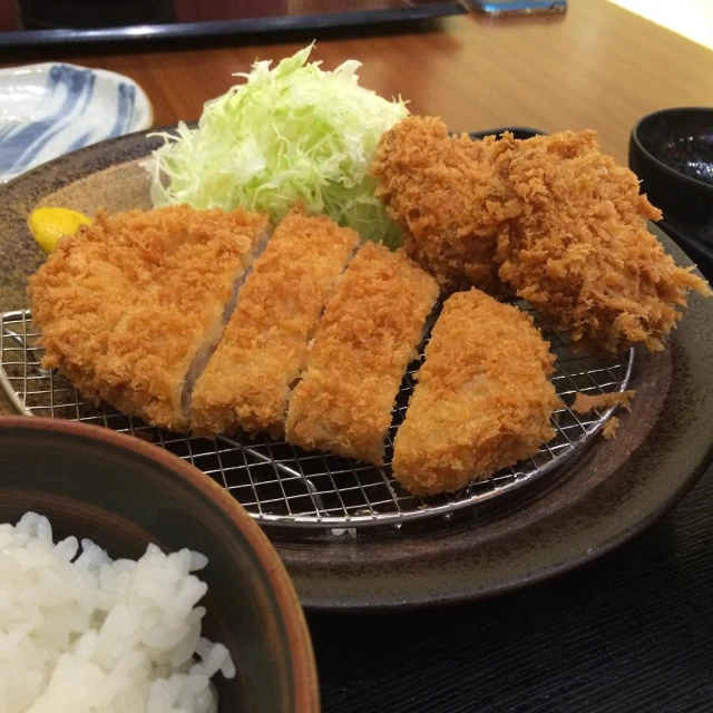 fried food items on a tray on a table