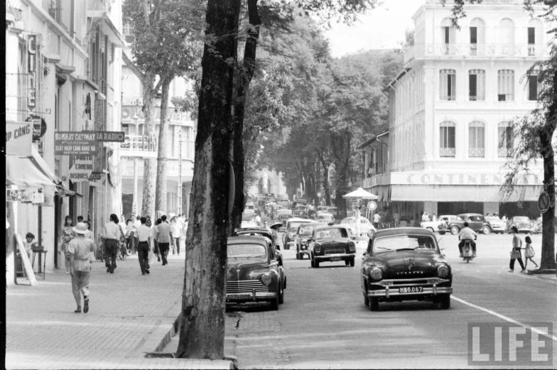 a view of a city street in the early 20th century