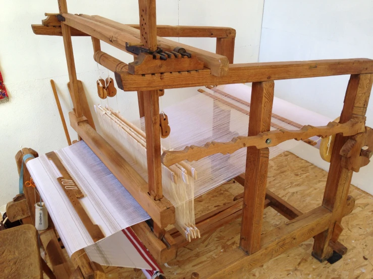 a close up of the front end of an old loom