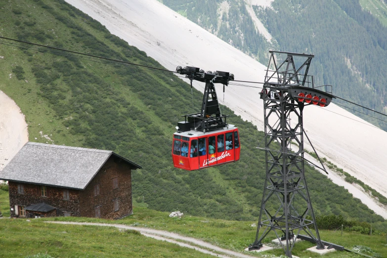 a cable car on the side of a steep hill