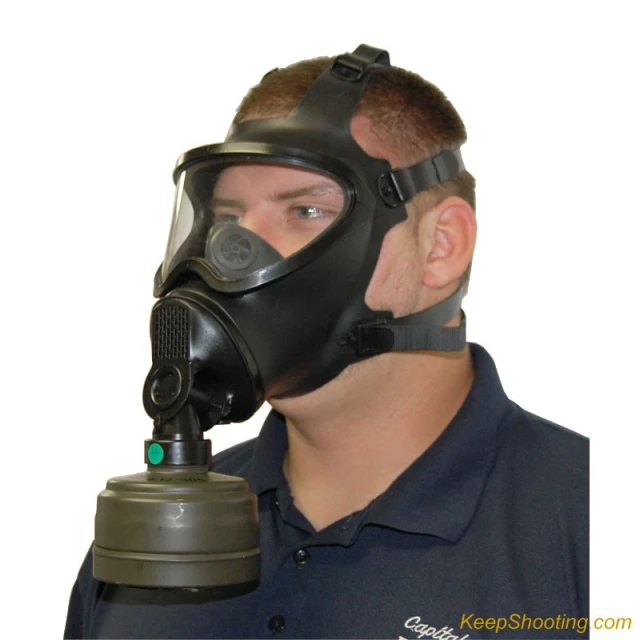 a man wearing a gas mask and with the words keep holding on