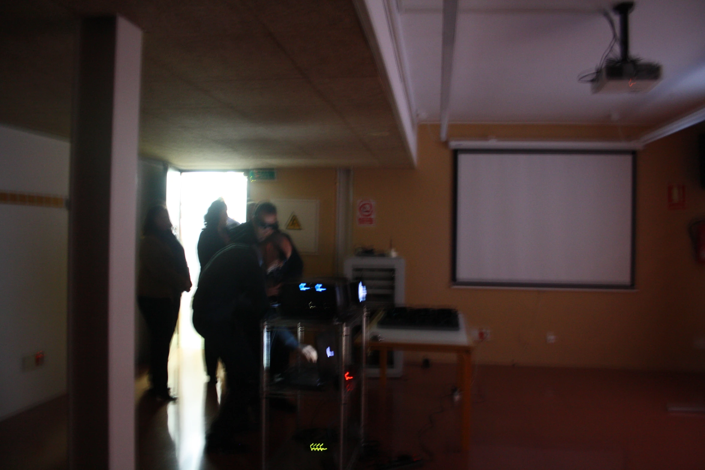 a group of people standing in a room