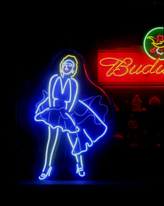 a neon sign is on the outside of the building