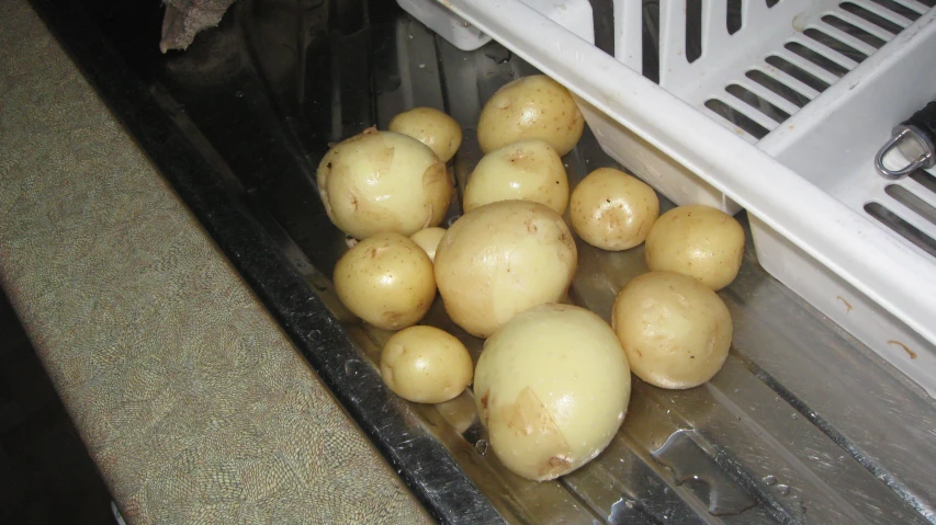 some potatoes that are in a food processor