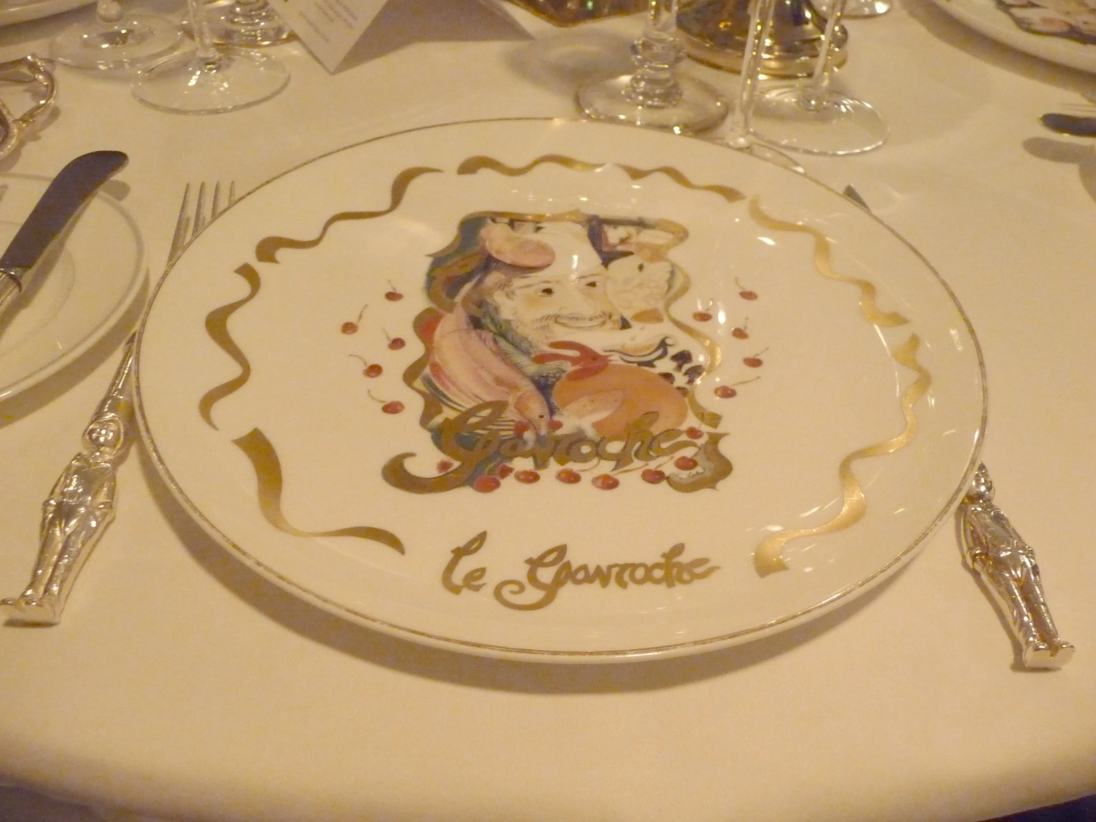 a white plate topped with a cartoon character