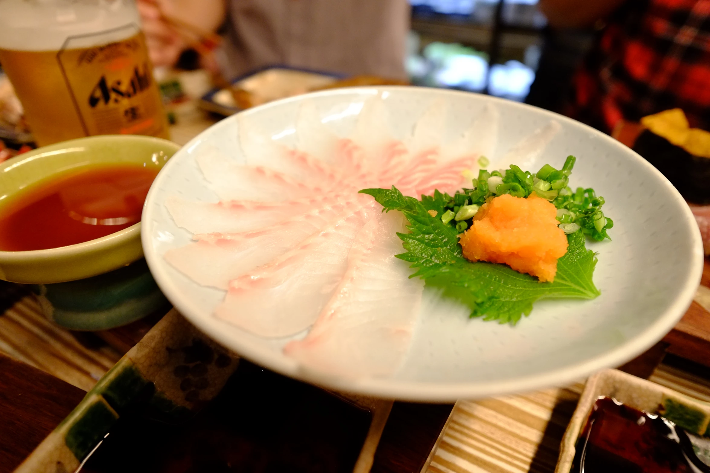 plate of food with dipping sauce on the side