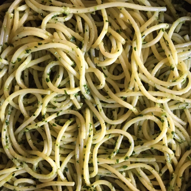 a close up s of some noodles being made in a pan