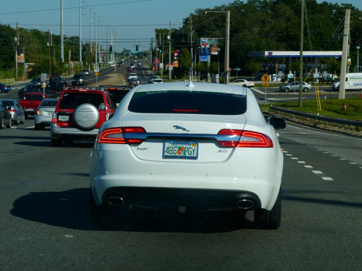 a car is travelling on a busy freeway