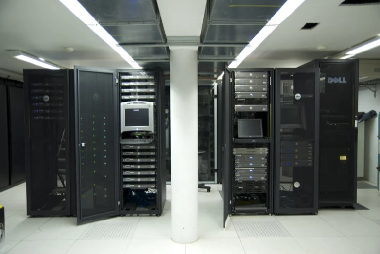 three servers in the center of a server room