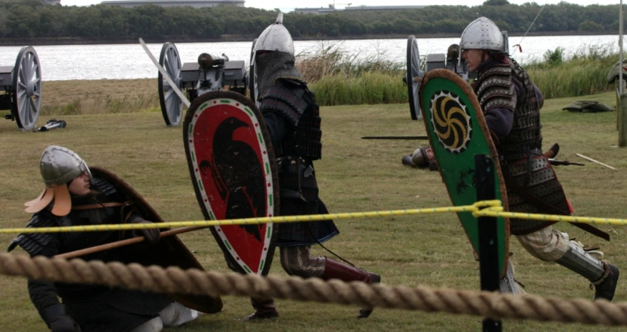 men dressed in medieval knight armor during a jousting competition