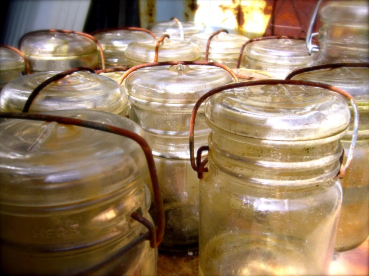 large jar's sitting next to each other in a room