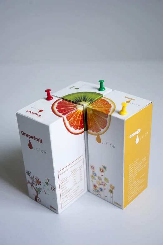 this is an image of a box with a gfruit cut into it