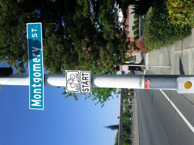 a pole with two street signs attached to it