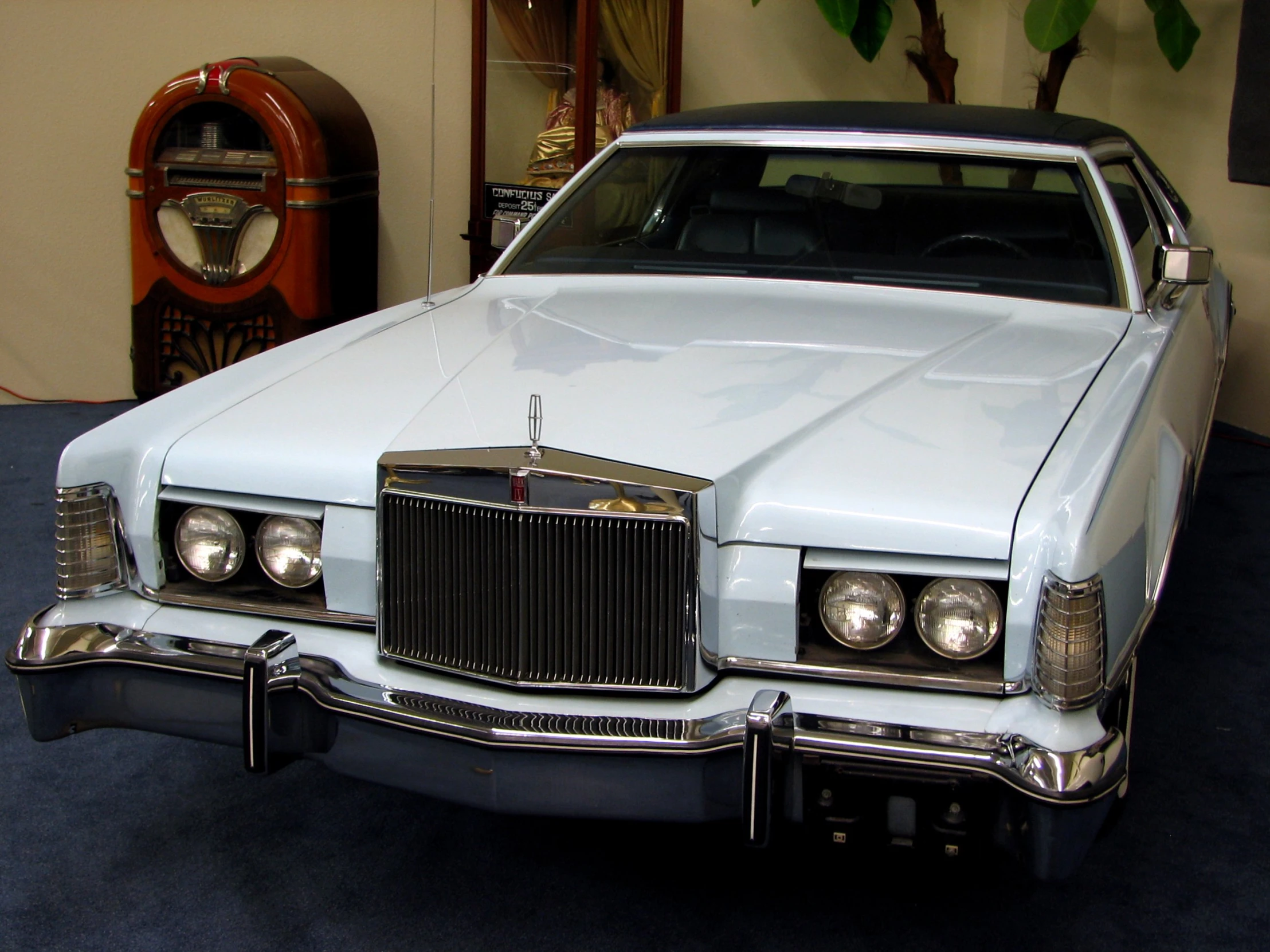 this is a very white classic car parked