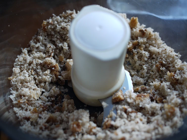 a food processor with several different ingredients inside