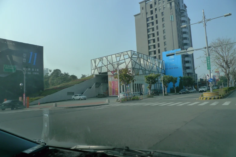 street corner, with building on the far side, in the distance