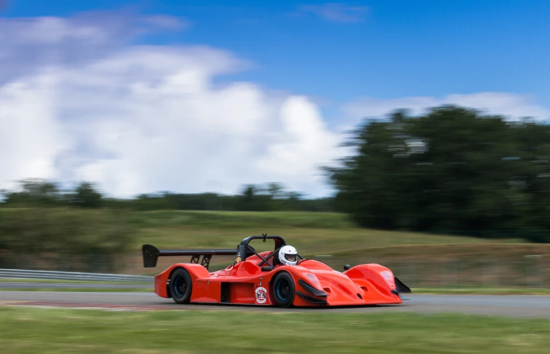 a racing car driving down the track