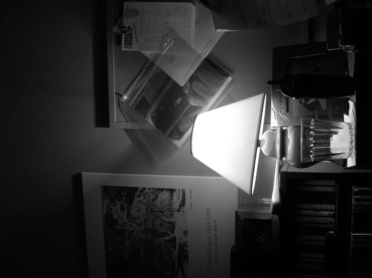 a black and white po of a desk and shelves