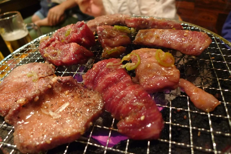 pieces of meat with sauce on a small tray