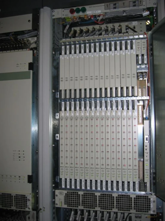 an open machine with lots of wires and a bunch of electrical equipment in it