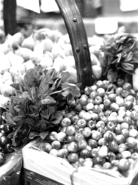 fruit in baskets on display at an open market