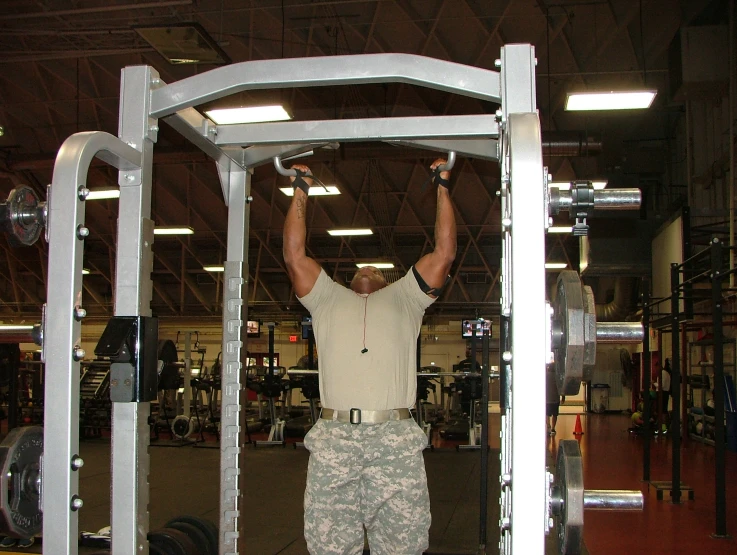 man standing at the top of a set of squats
