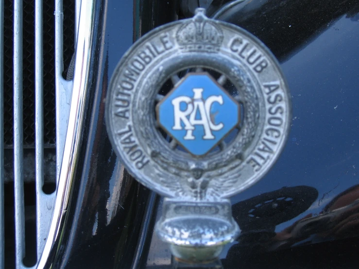 this is a classic vehicle emblem hanging on a door