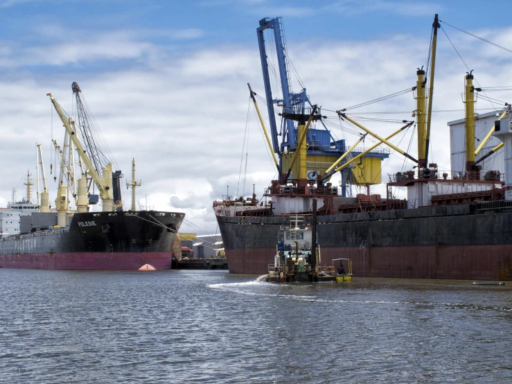 two boats that are floating on a body of water